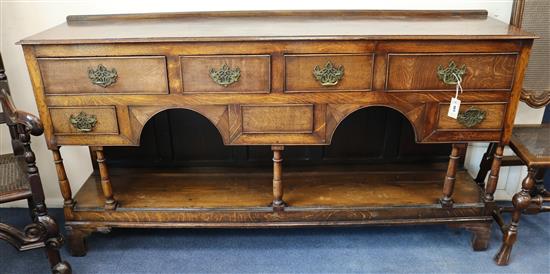 An early 18th century Welsh oak dresser base W.177cm